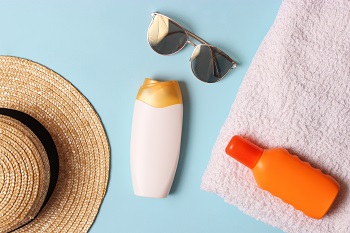 Sunscreens on a colored background close-up. Sun protection for skin.
