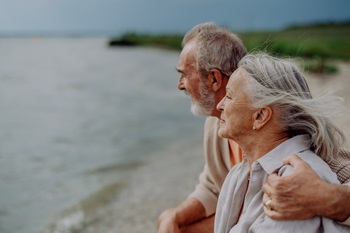 Elderly couple at shoreline